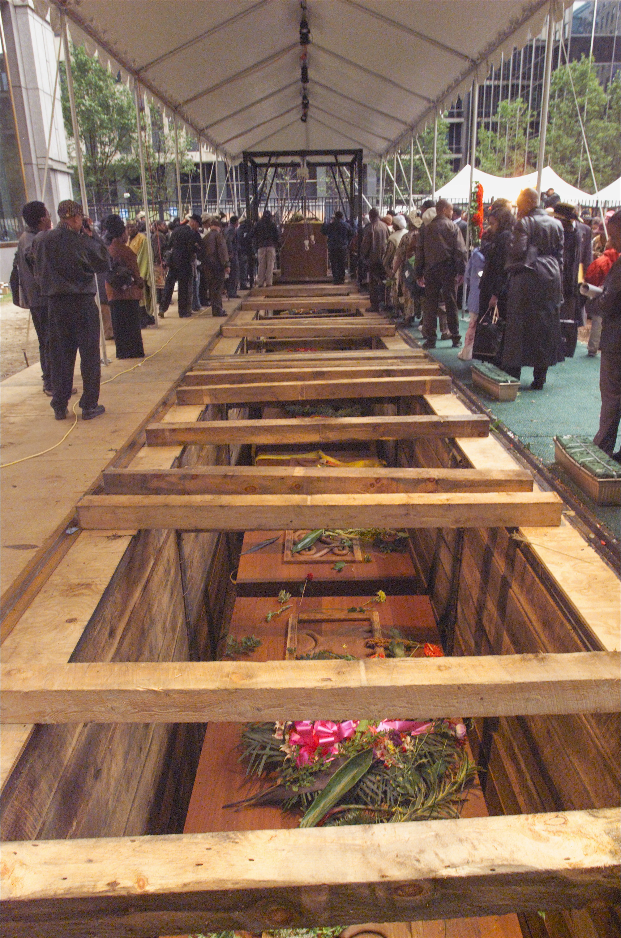 Vaults being lowered to into ground for the African Burial Ground Project