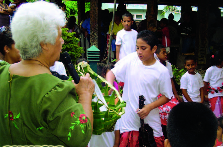 Children learn traditional skills at a heritage camp in American Samoa. 
