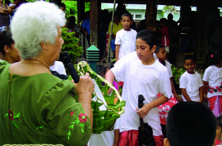 Children learn traditional skills at a heritage camp in American Samoa.