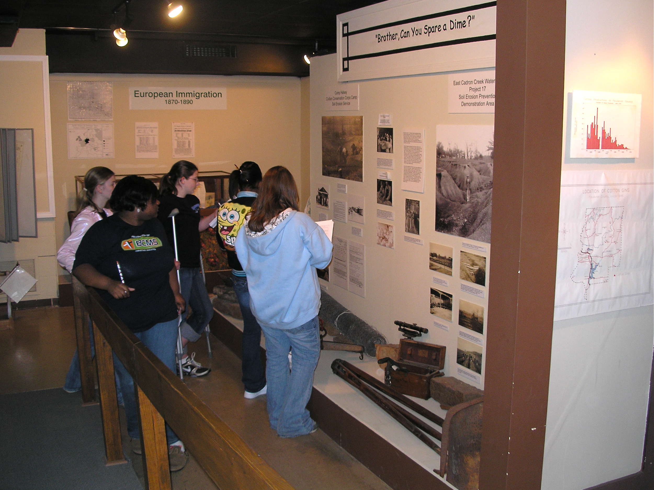 A school group visits the Faulkner County Museum in Conway, Arkansas