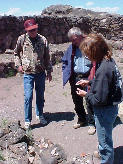 In the Great Kiva at the Casa Malpais site, a guide uses pottery sherds to explain the development of technology and trade