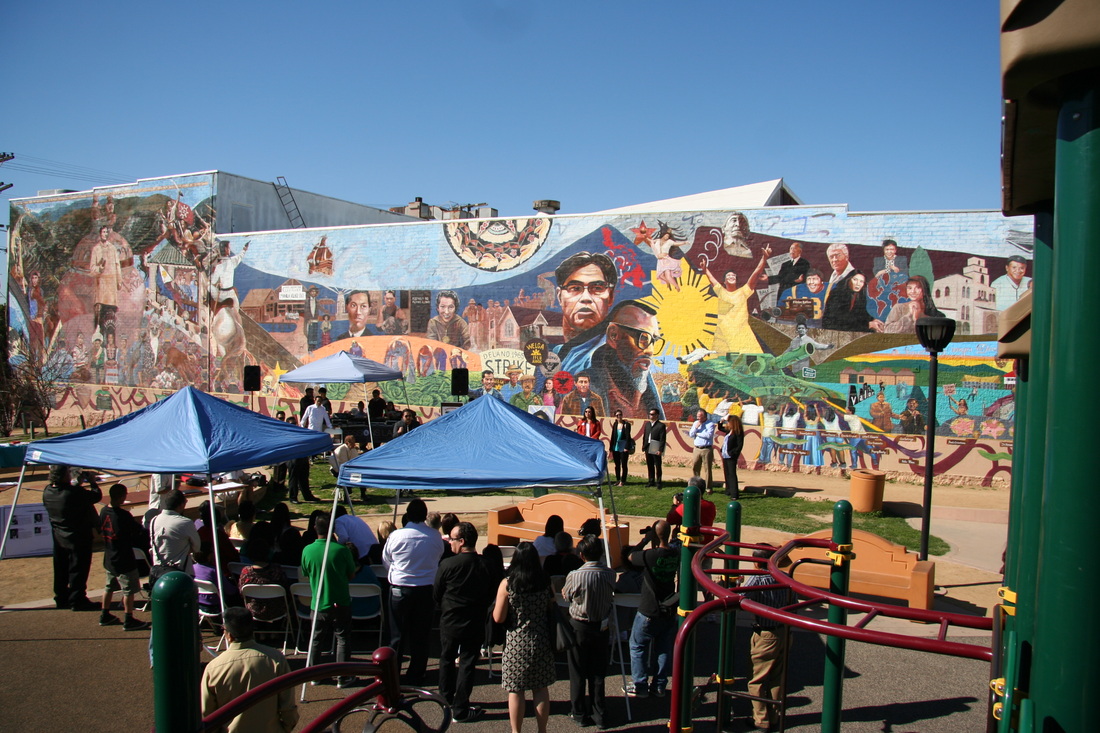 Gintong Kasaysayan, Gintong Pamana (A Glorious History, A Golden Legacy) is a colorful mural in Unidad Park depicting Filipino American history and culture.
