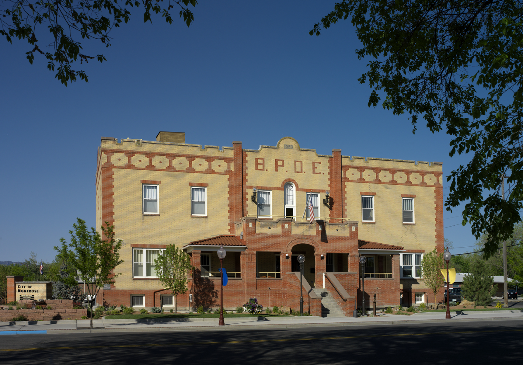 The Elks Lodge in Montrose, Colorado, an award winning adaptive reuse project, now serves as a municipal services center and meeting venue. The restoration included the installation of a renewable energy geo-exchange system for heating and cooling.