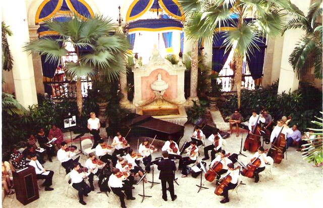 An orchestra performs at the Vizcaya Museum and Gardens, a 1916 Italianate villa which is a National Historic Landmark.
