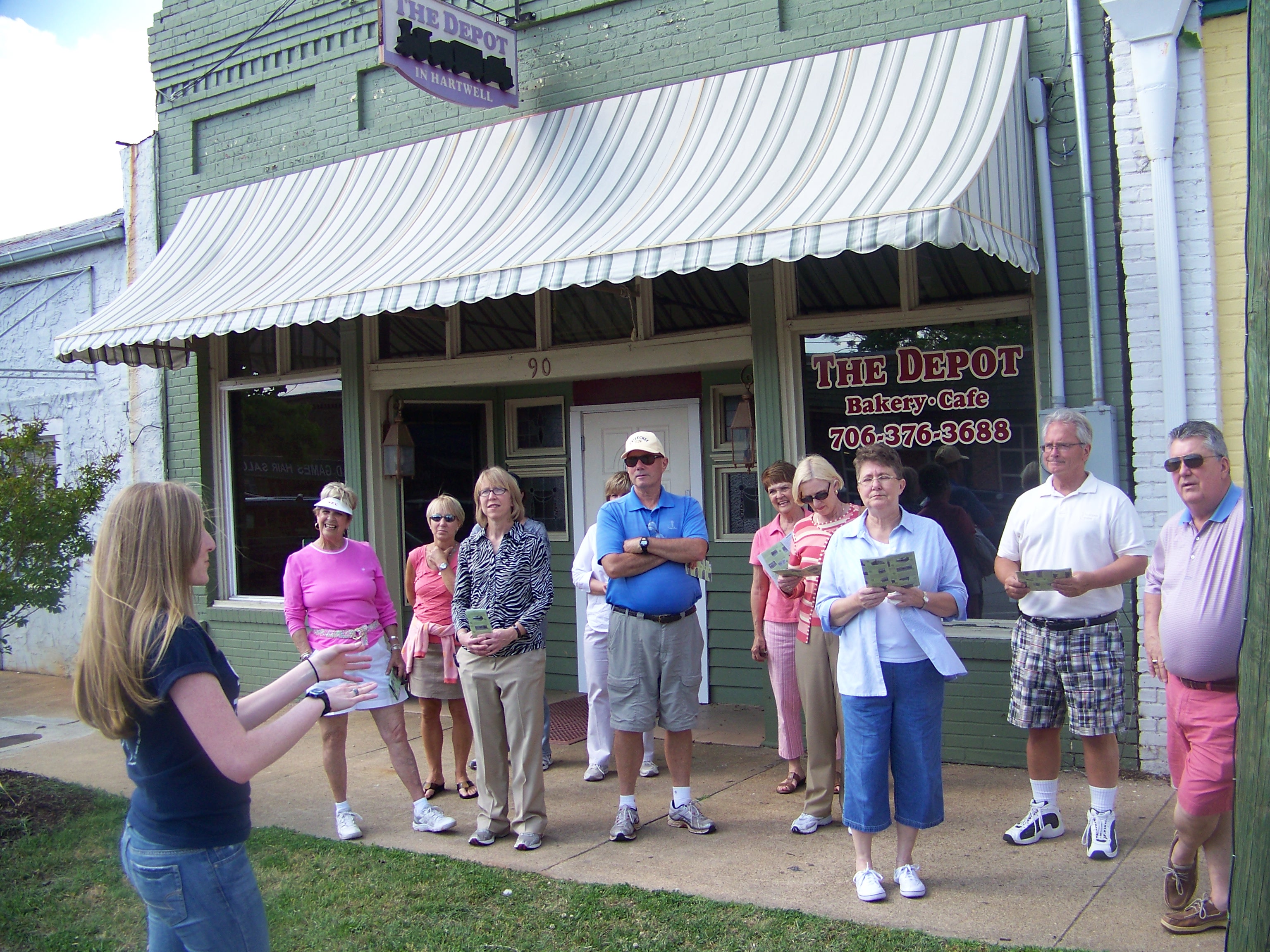 A group on a downtown walking tour in Hartwell, Georgia