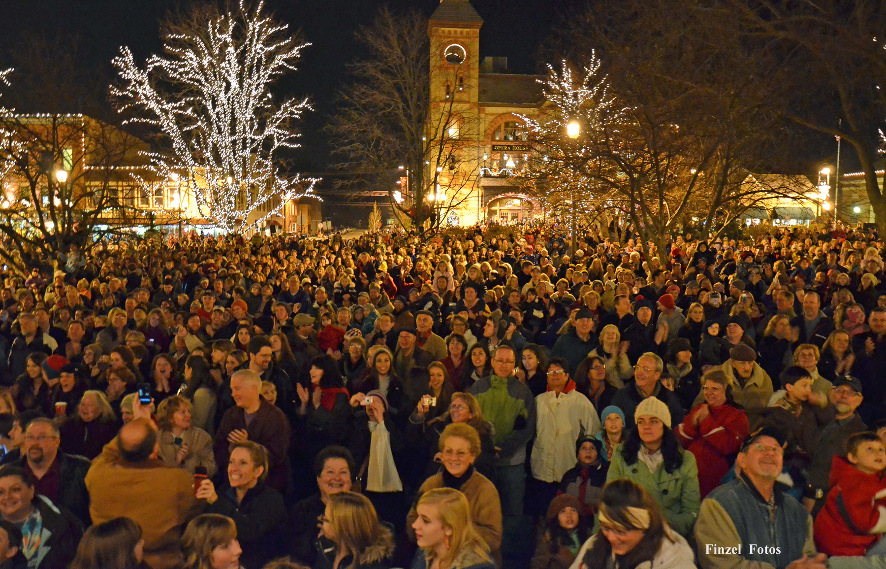 Residents celebrate the annual Lighting of the Square event in the Woodstock Square Historic District, where the 1993 movie, Groundhog Day, was filmed.