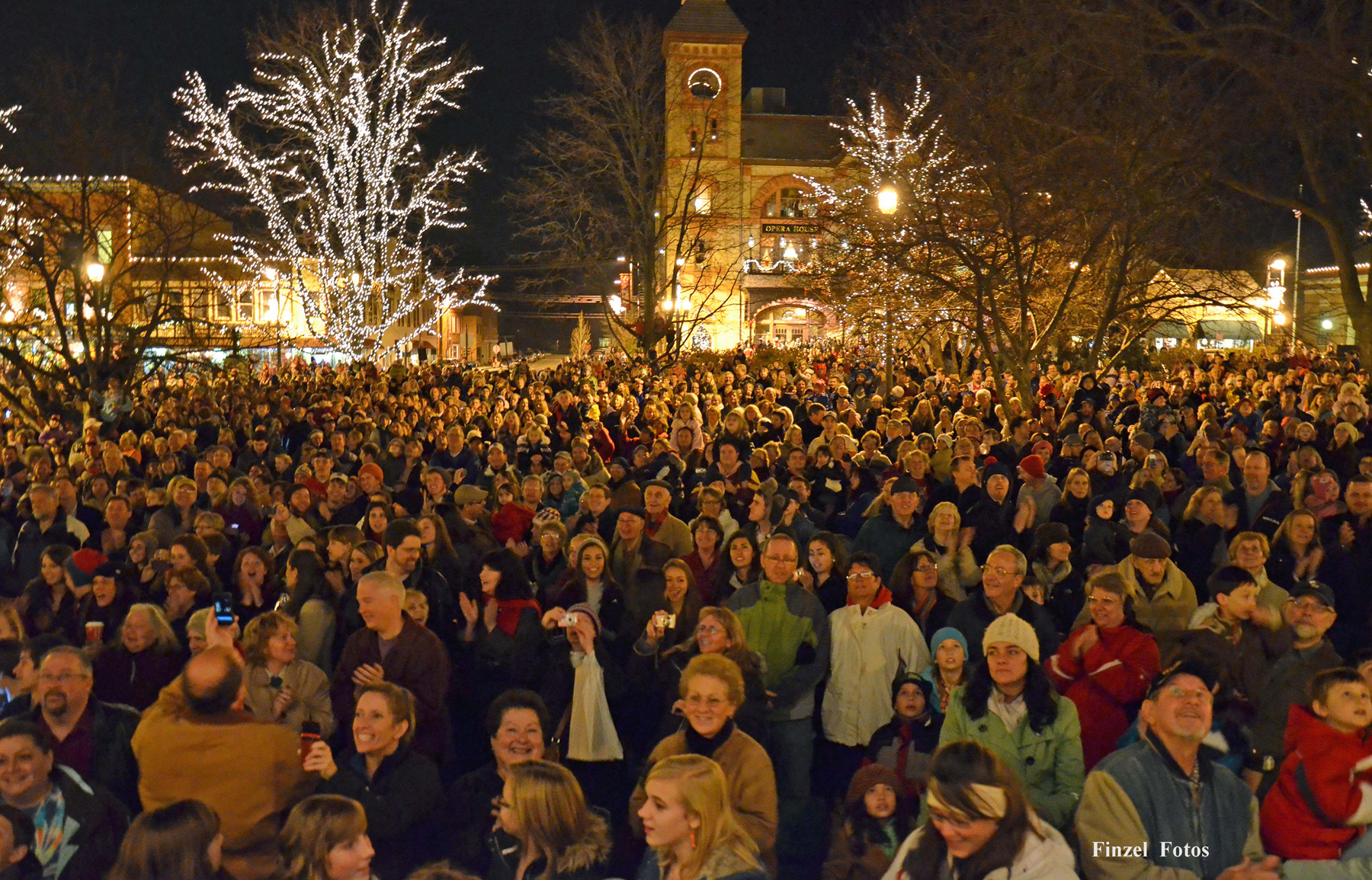 Residents celebrate the annual Lighting of the Square event in the Woodstock Square Historic District, where the 1993 movie, Groundhog Day, was filmed.