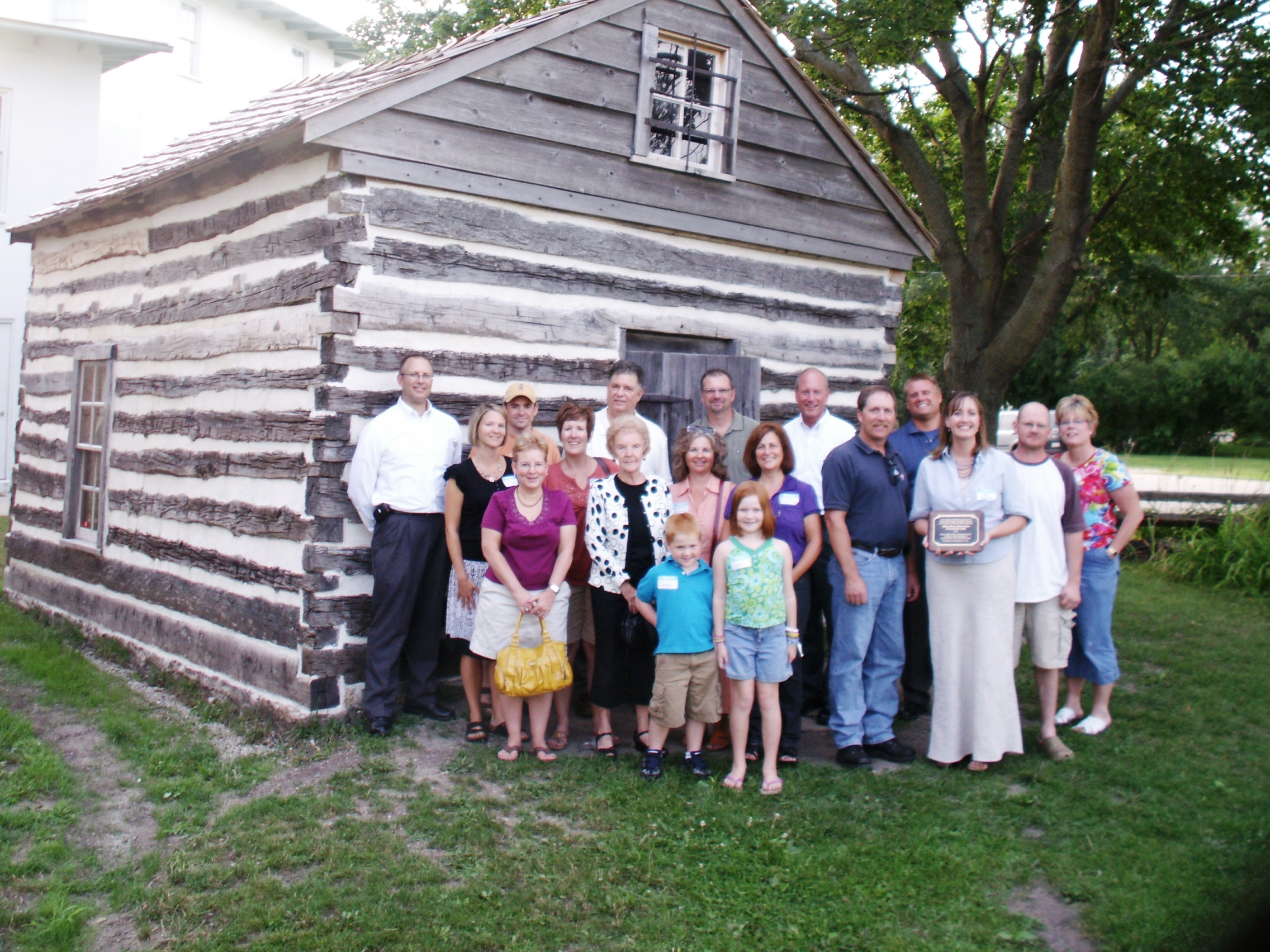Members of the Milton Historical Society who worked to restore the historic Goodrich Cabin.