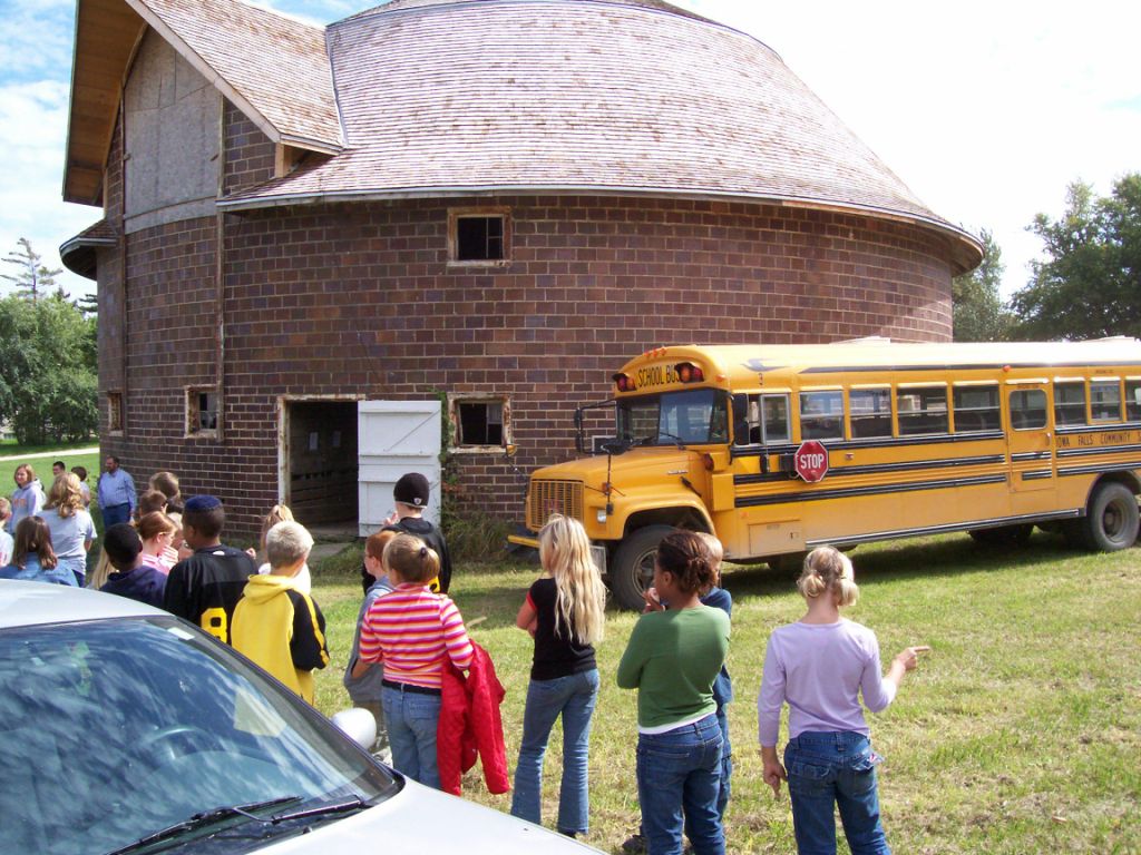 Children visit the National Register-listed ‘Slayton Farms Round Barn’ 