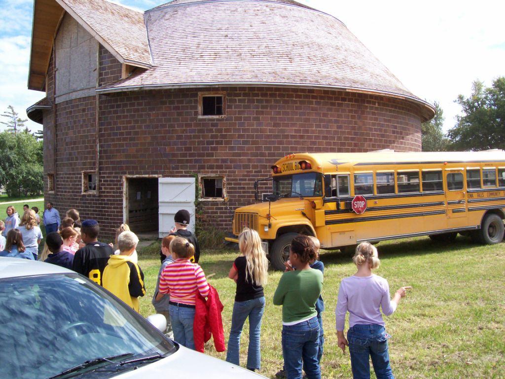 Children visit the National Register-listed ‘Slayton Farms Round Barn’