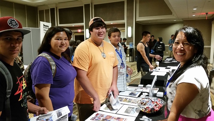 Dr. Dorothy Lippert (right), a member of the Advisory Council on Historic Preservation, talks with Native Youth at the UNITY Career Expo.
