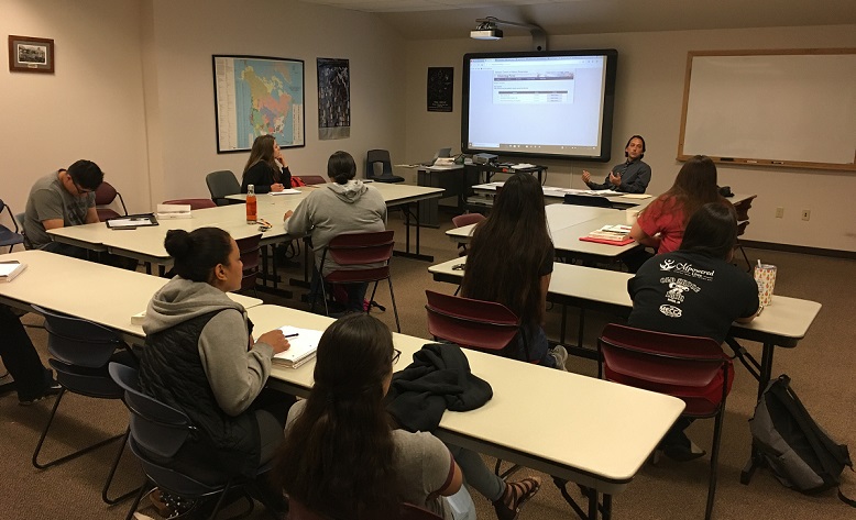 Image of Ira Matt presenting on Section 106 to Salish Kootenai College students