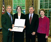 The Bushes with Mary Regan and Wayne Martin. (White House photo by Paul Morse)