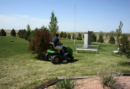 Volunteer students mowing