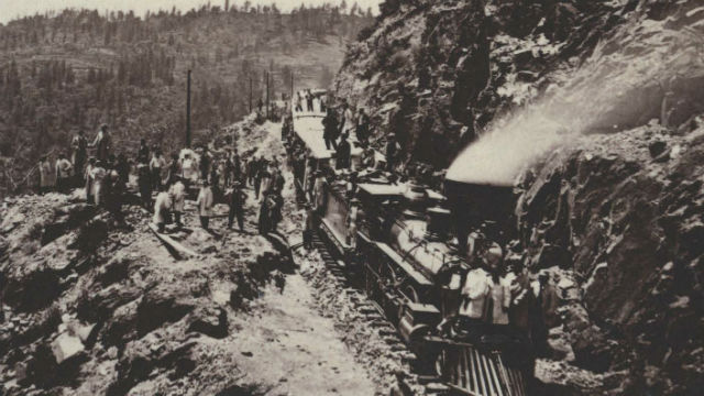 CHINESE IMMIGRANT LABORERS BUILDING THE TRANSCONTINENTAL RAILROAD 