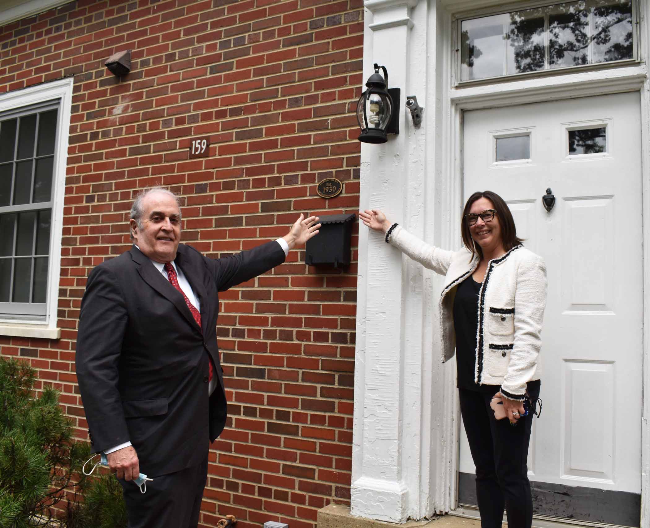 Hon. Alex Beehler, Assistant Secretary of the Army for Installations, Energy, and Environment and ACHP Chairman Aimee Jorjani at an Inter-War Era home on Fort Belvoir, Virginia