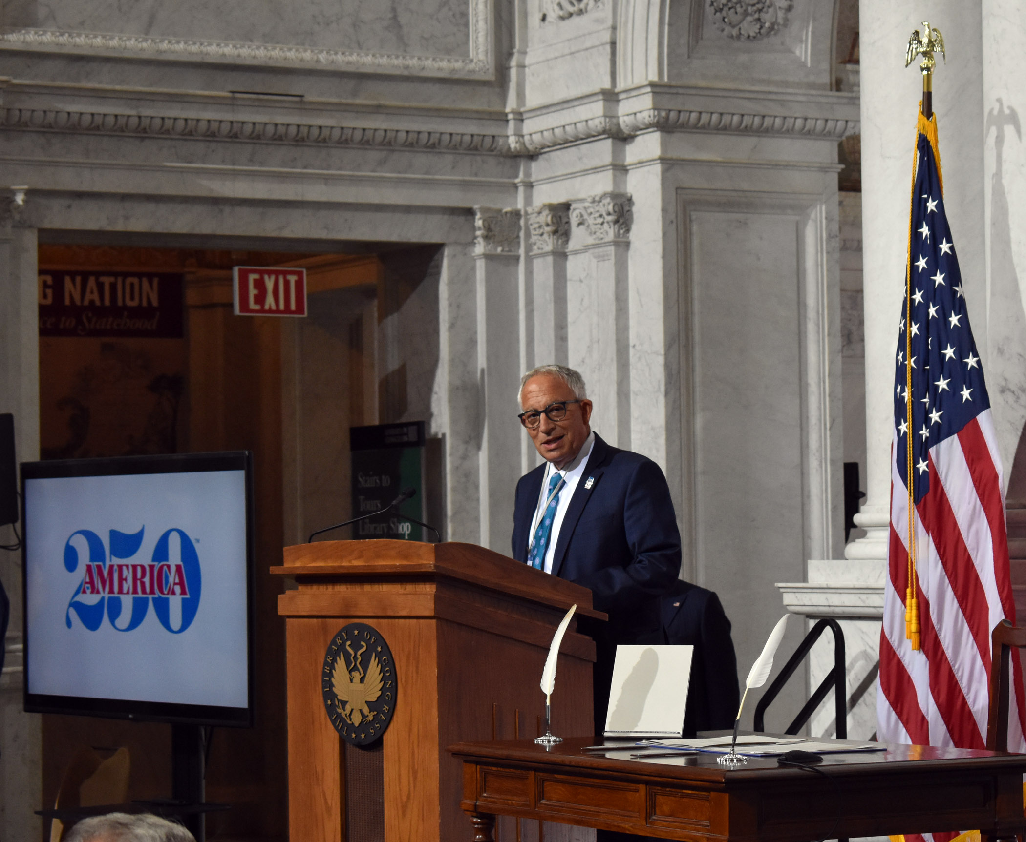 ACHP Vice Chairman Jordan Tannenbaum speaks during America250 agreement signing ceremony at the Library of Congress