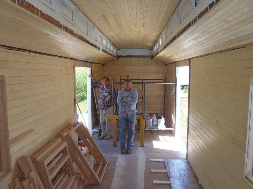 Volunteers restore the wooden interior of an historic train car on the Cumbres and Toltec Scenic Railroad. (Credit: Tim Smith.)