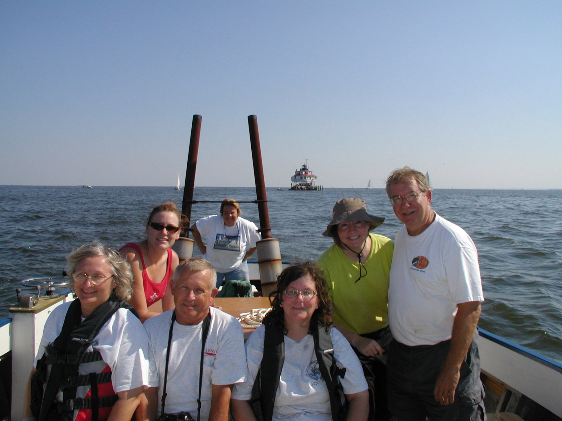 Volunteers returning to shore after a day's work at Thomas Point Shoal Lighthouse. (Photo credit: H. Gonzalez and USLHS.)
