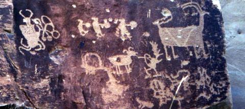 Indigenous rock writing on boulder