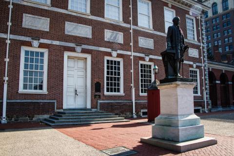 Statue of George Washington in front of Independence Hall. 