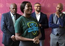 Kayla Heards speaks about her experiences at a press conference about Touching History at Tuskegee University in August.