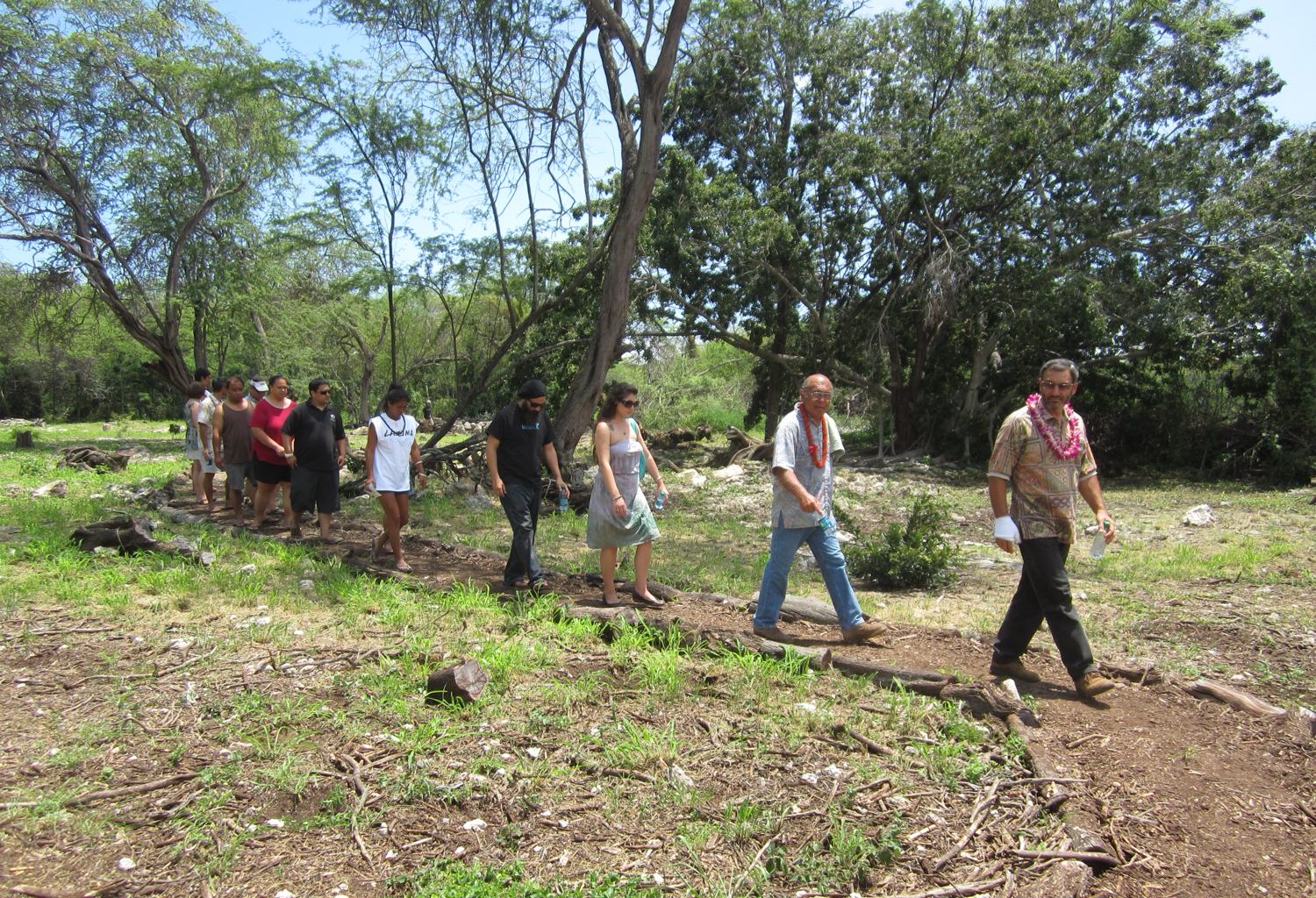 Visitors to the park walking along a trail