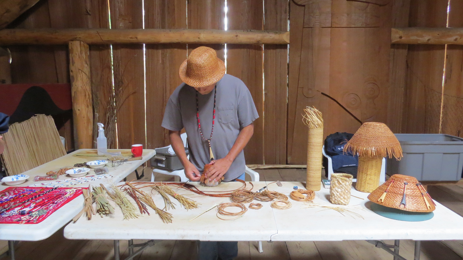 Artist-in-residence Greg Archuleta prepares demonstration materials for visiting students